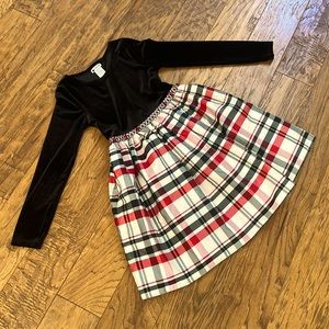 size small, festive black white and red, partially worn . Brand Emily west.